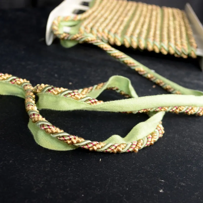 Stock/Europatex Cord 873 Childs Play Red Gold Green Lip Cord Trim> Toile